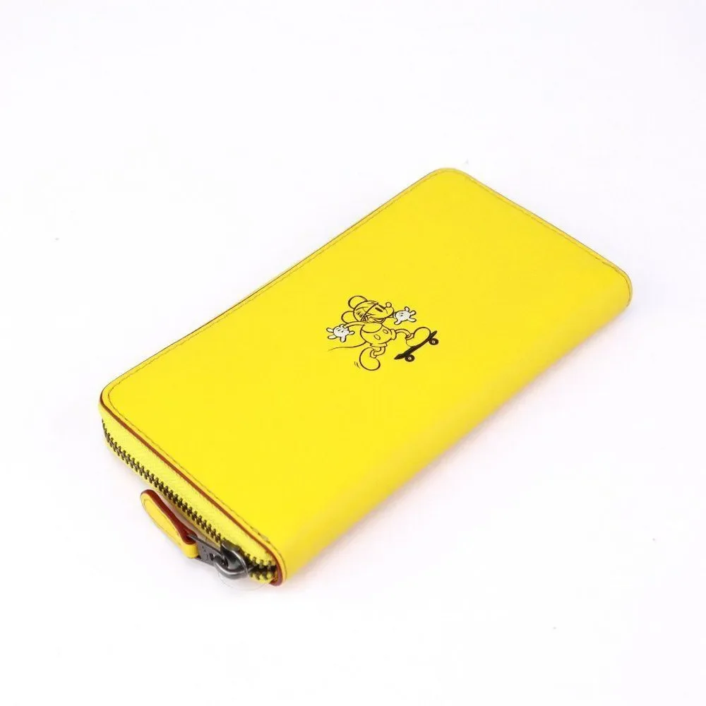 New Coach Disney Mickey Riding Skateboard Accordion Zip Wallet Banana Yellow - Picture 6 of 12